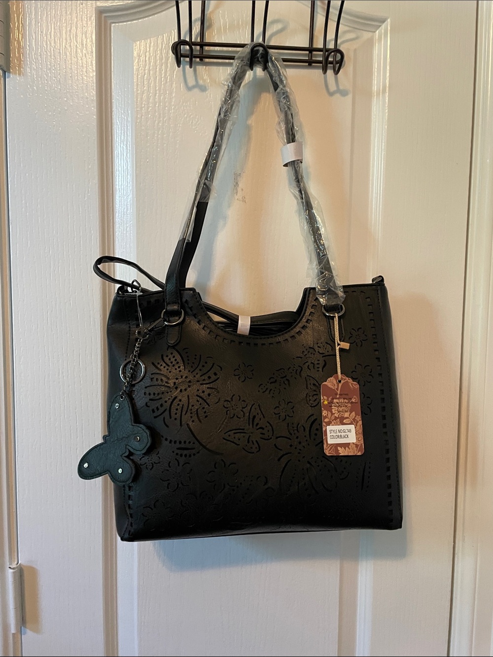 Black Floral Cutout Shoulder Bag with Butterfly Charm